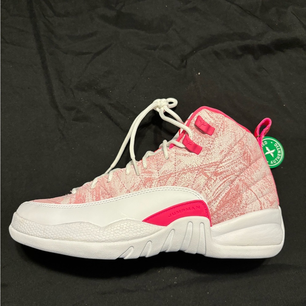 Never worn. Pink Jordan 12 Retro 7Y